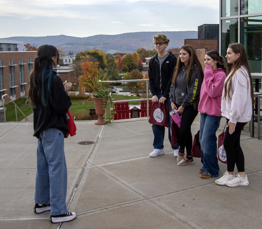 SUNY Oneonta tour guide speaking to students on a tour