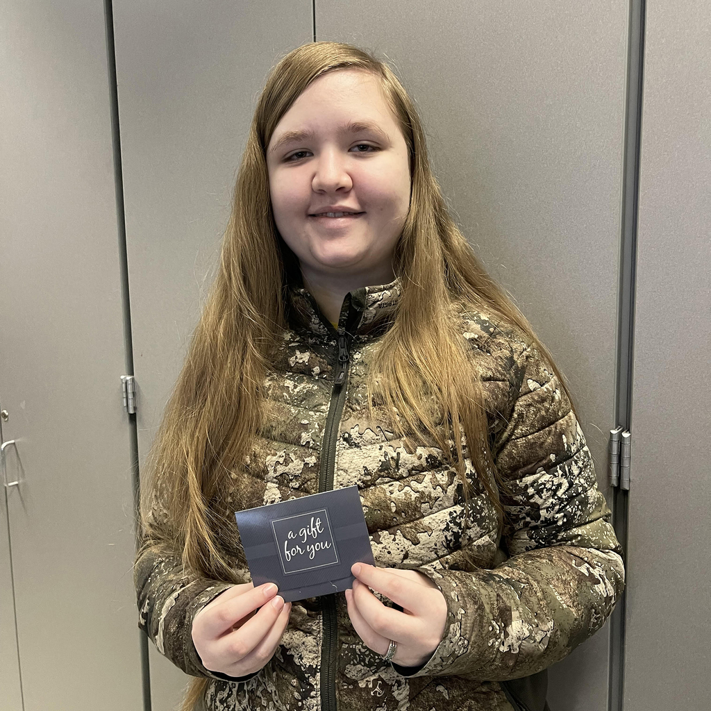 picture of student holding gift card