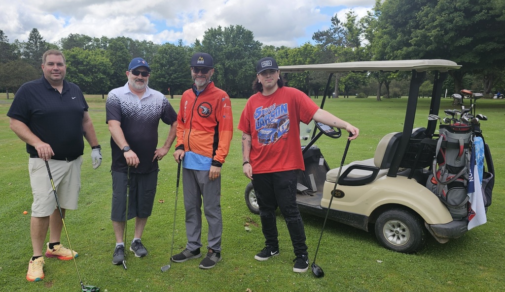 4 golfers and a cart