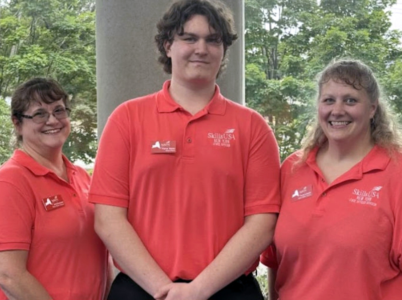 Pierce Haney with two SkillsUSA advisors