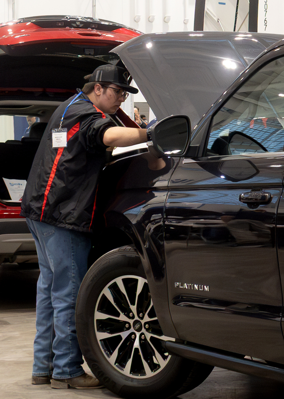 student competing in auto technology competition