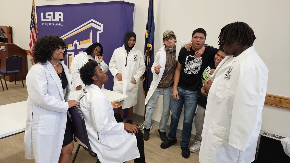 The Lab Rats discuss their pregame strategy at the LSUA tournament.