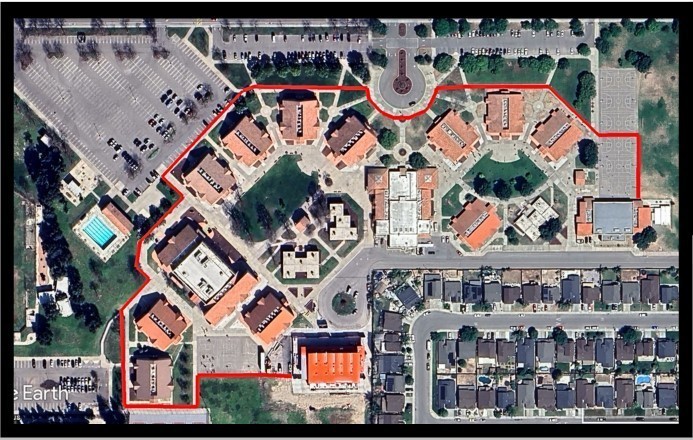 Image of aerial view of campus with red line outlining potential fence