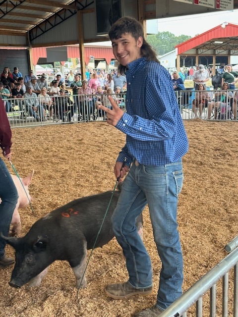Student with pig