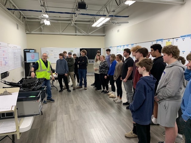 Students learning about the operations of TG Missouri