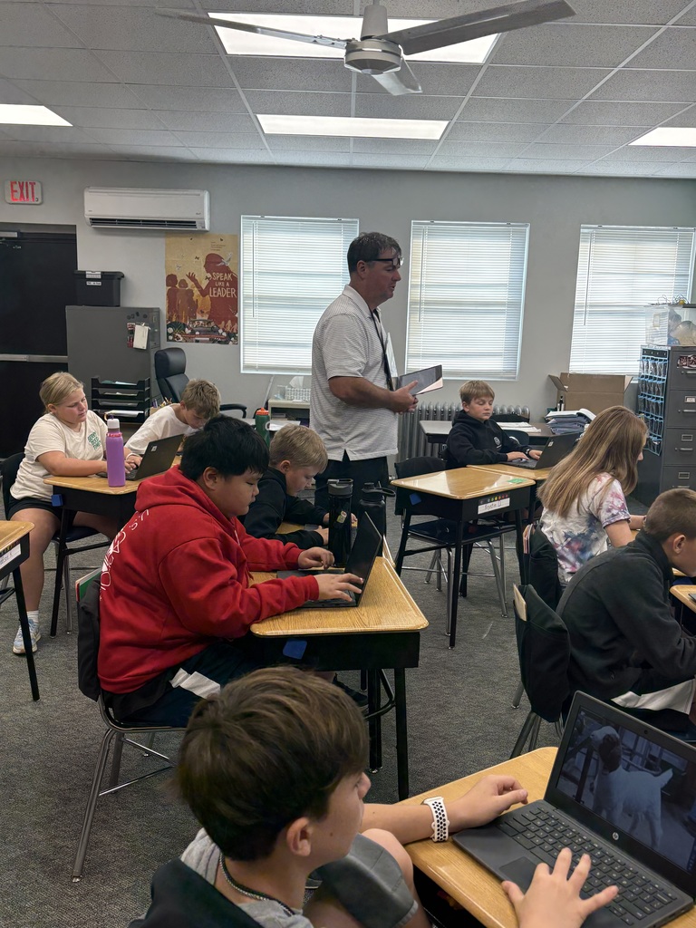 Ray teaching 6th grade class