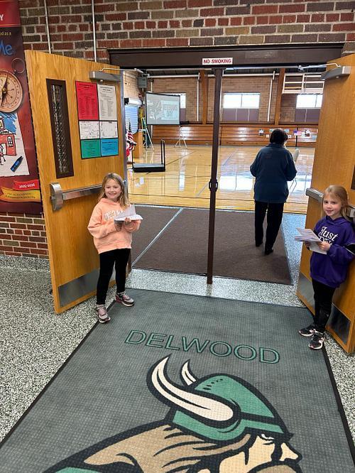 Student Leaders greeting guests for Veterans Day Program