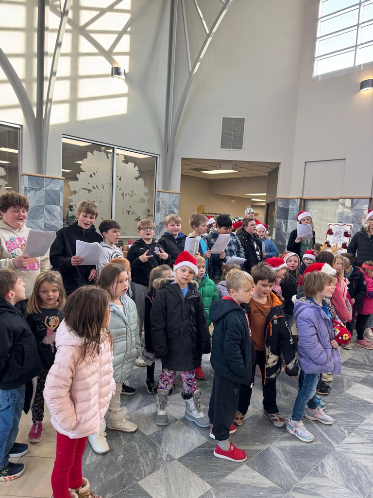 Students caroling at nursing homes in Maquoketa