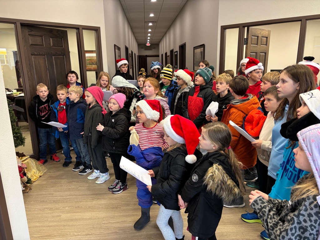 Students caroling at nursing homes in Maquoketa