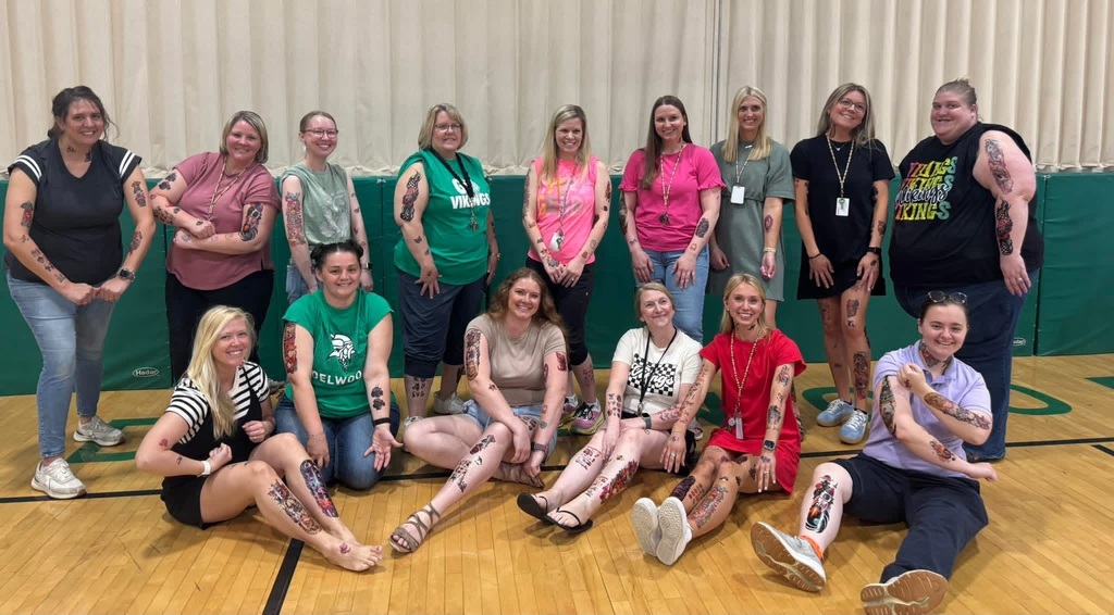 tattooed teacher group photo