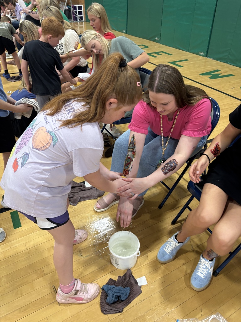 Ava Pape tattooing Mrs. Hartung