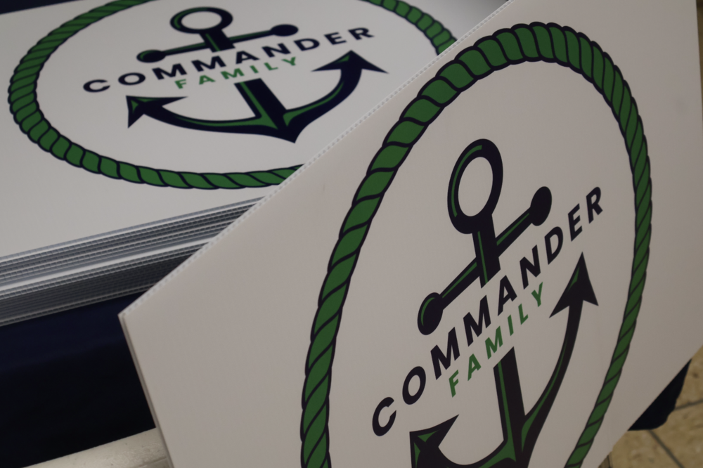 Commander Family yard signs
