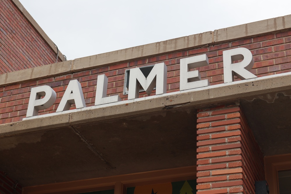 Part of the PALMER ELEMENTARY SCHOOL sign above the Palmer ECE Center in Denver