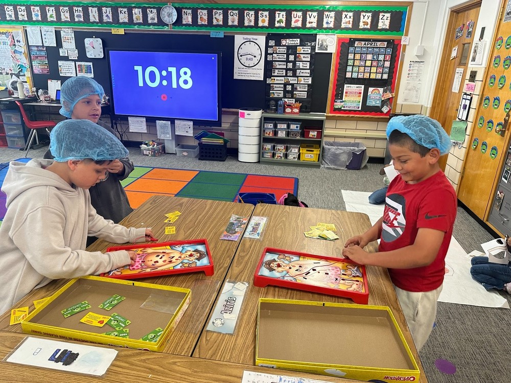 Students playing Operation