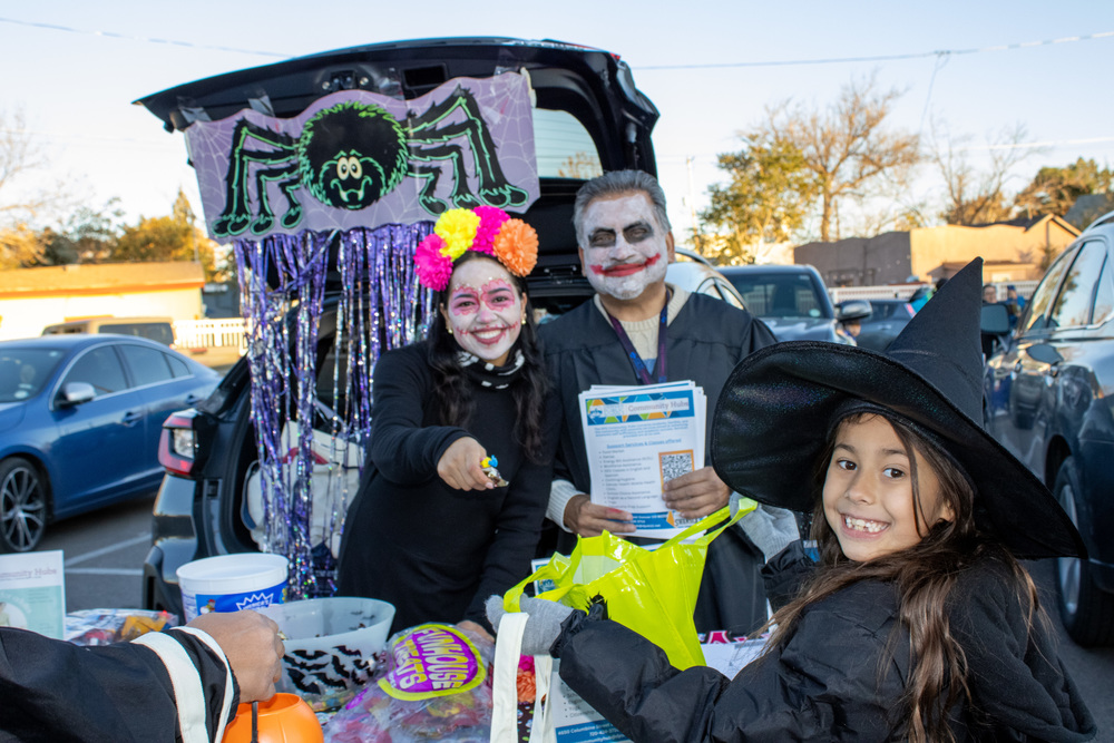 A student goes trick-or-treating at Swansea's annual Trunk or Treat event.