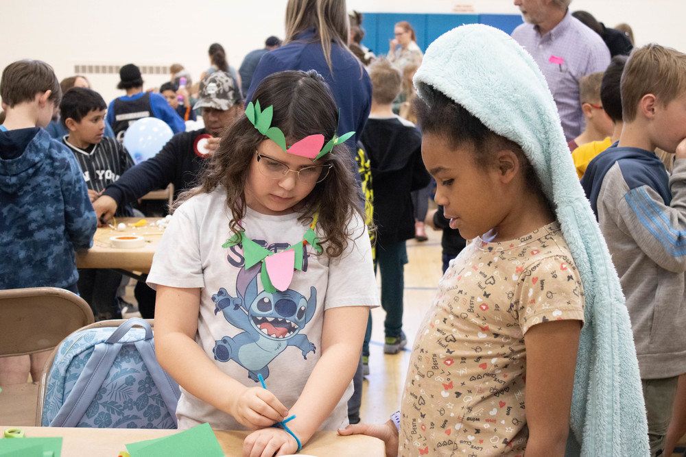 McMeen students working on an art project together at family arts night