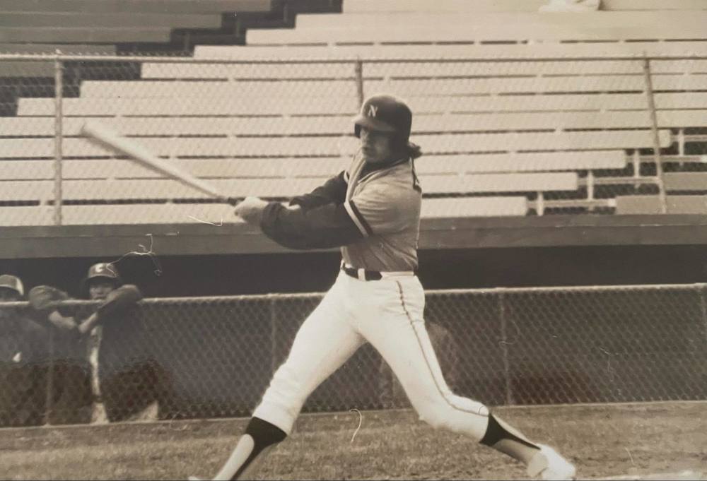 baseball swinging a bat