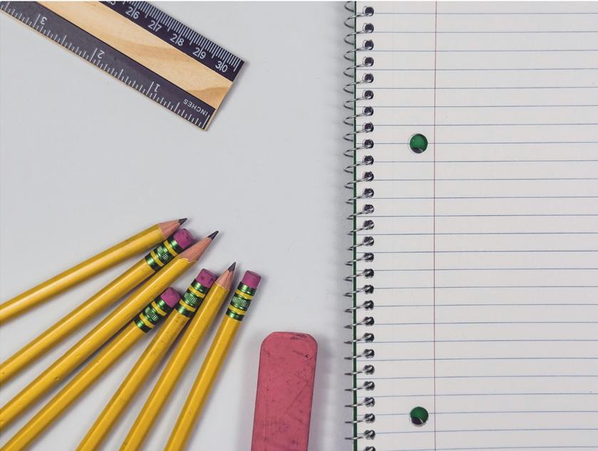 Pencil, eraser and notebook