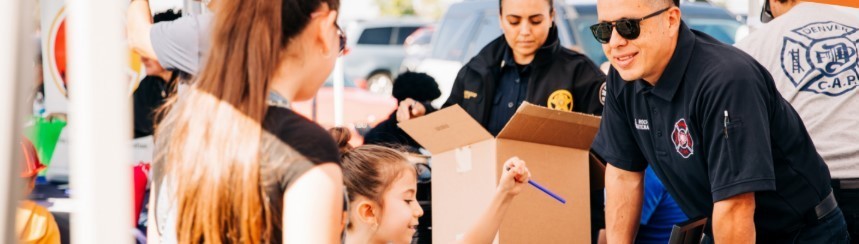 First responder interacting with a young girl