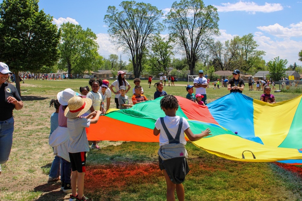 Students with parachute at field day