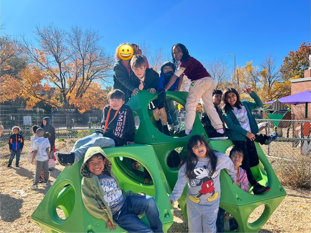 students on play equipment