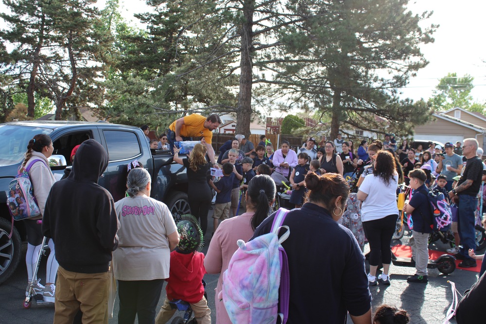 Dean od Students talking to a group of  families 