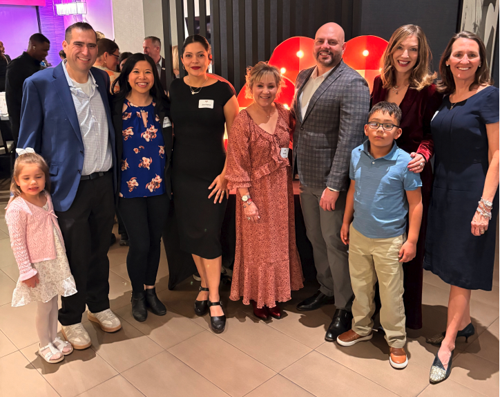 Staff and students at food distribution event.