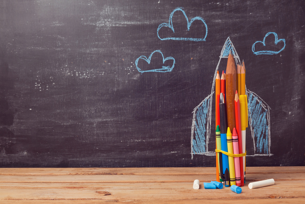 Rocket ship on chalkboard