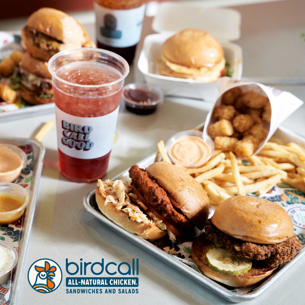 Trays of chicken sandwiches and sides