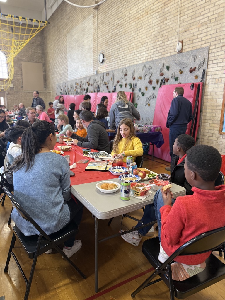 Families enjoying soup in the Polaris Gym