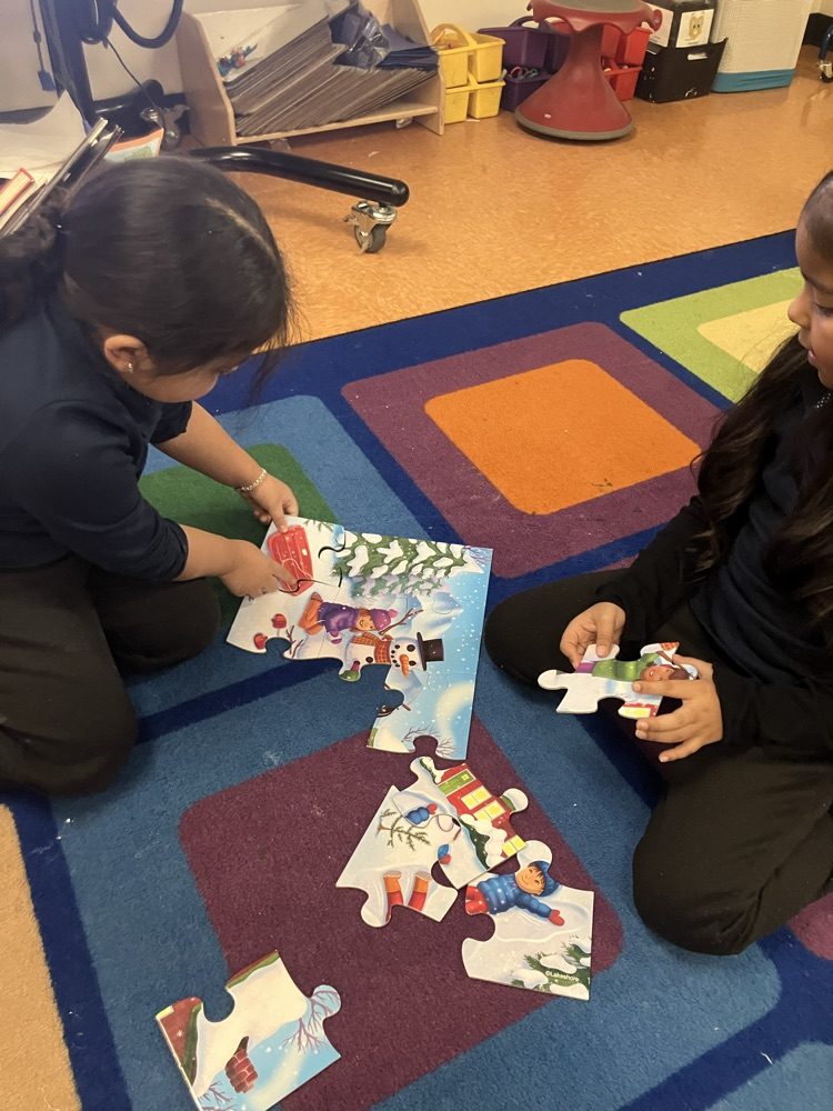 working together on a winter puzzle 