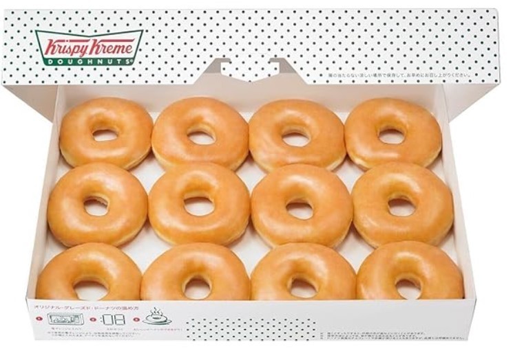 An open white box with a dozen glazed donuts  inside 