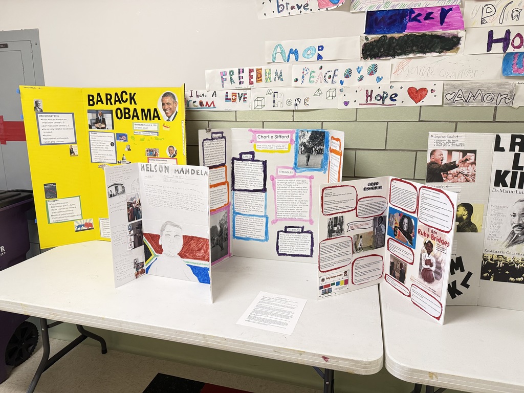 Student posters about Barack Obama, Nelson Mandala, Charlie Sifford, Ruby Bridges