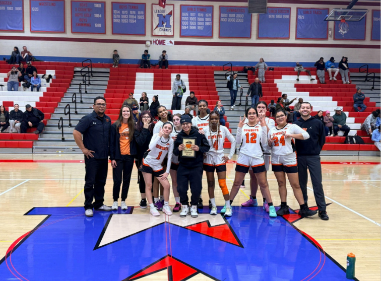 Congratulations to our girls' basketball team for winning the league tournament.