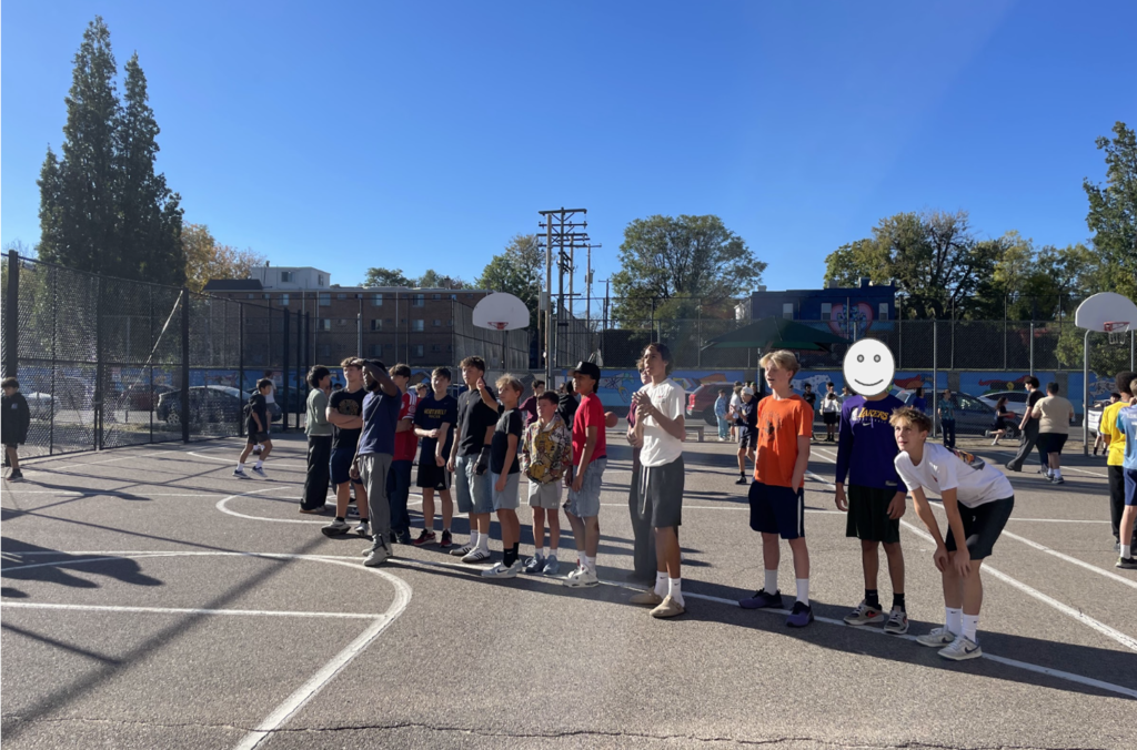 Boys playing basketball