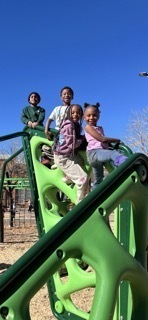 students on play equipment