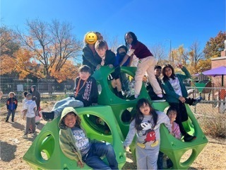 students on play equipment