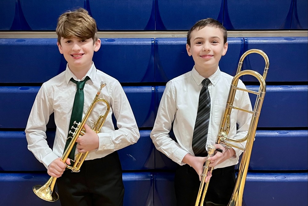 Students pose with instruments