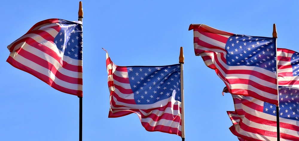 American flags wave in the wind.