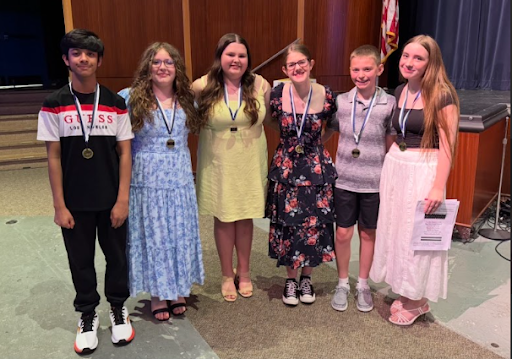 Students pose for a photo at the NJHS induction ceremony.