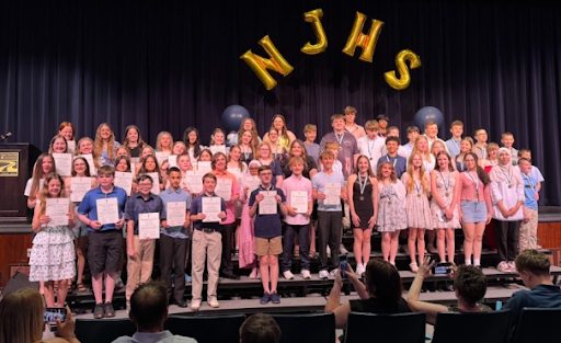 Students pose for a photo at the NJHS induction ceremony.