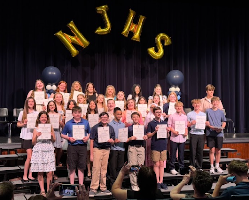 Students pose for a photo at the NJHS induction ceremony.