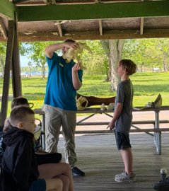 Students pose for a photo at Beaver Island.