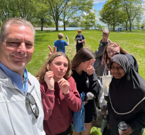 Students pose for a photo at Beaver Island.
