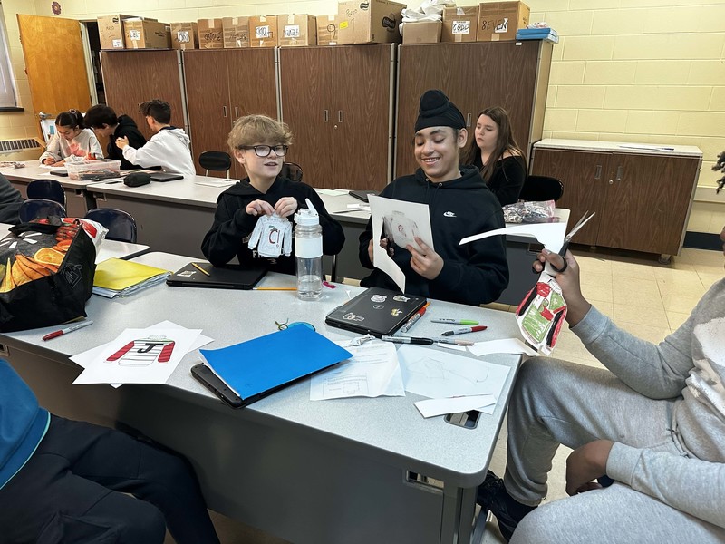 Students work and decorate doors at LMS.