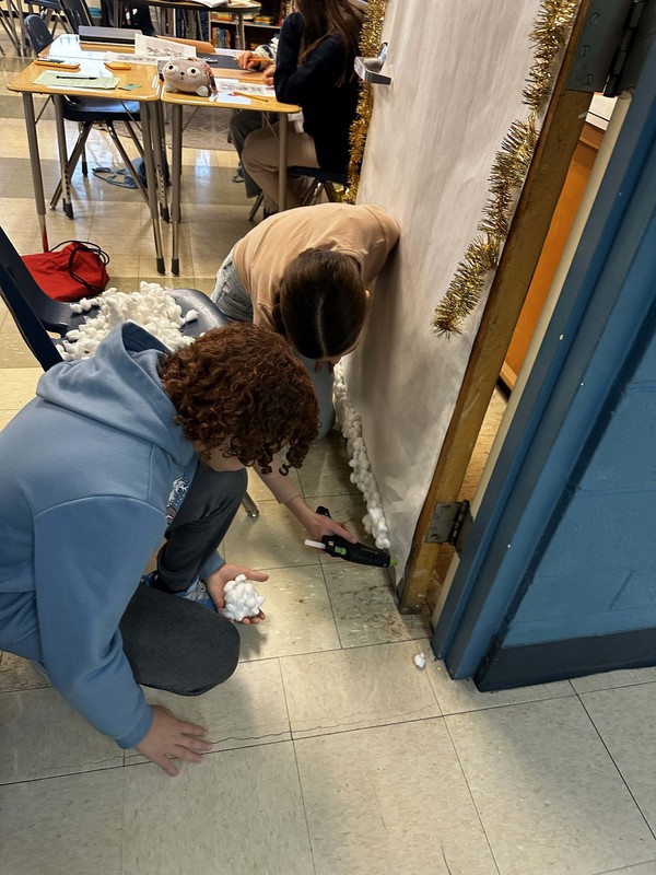 Students work and decorate doors at LMS.