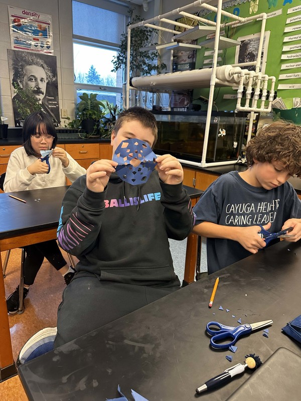 Students work and decorate doors at LMS.