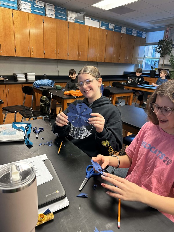 Students work and decorate doors at LMS.