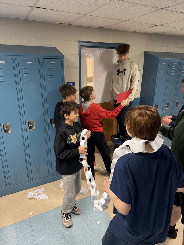 Students work and decorate doors at LMS.