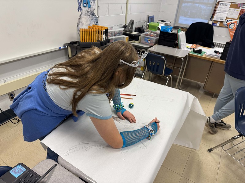 Students work and decorate doors at LMS.